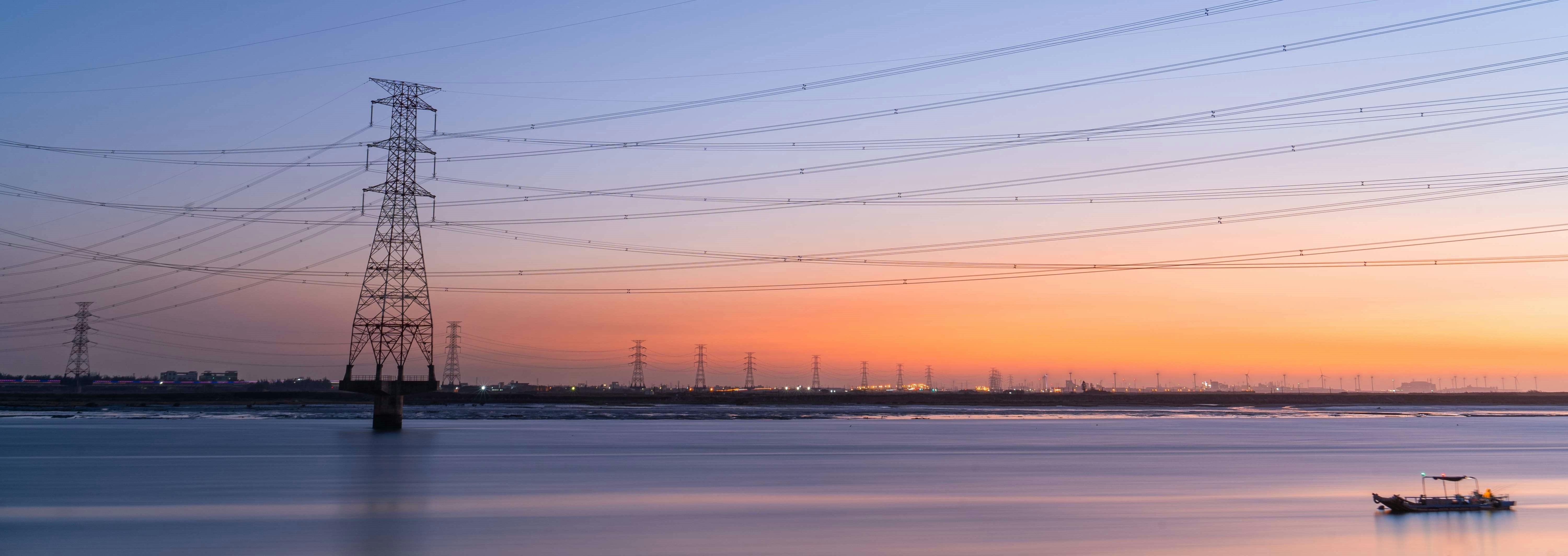 A traveler overlooking a vast landscape, symbolizing open routes